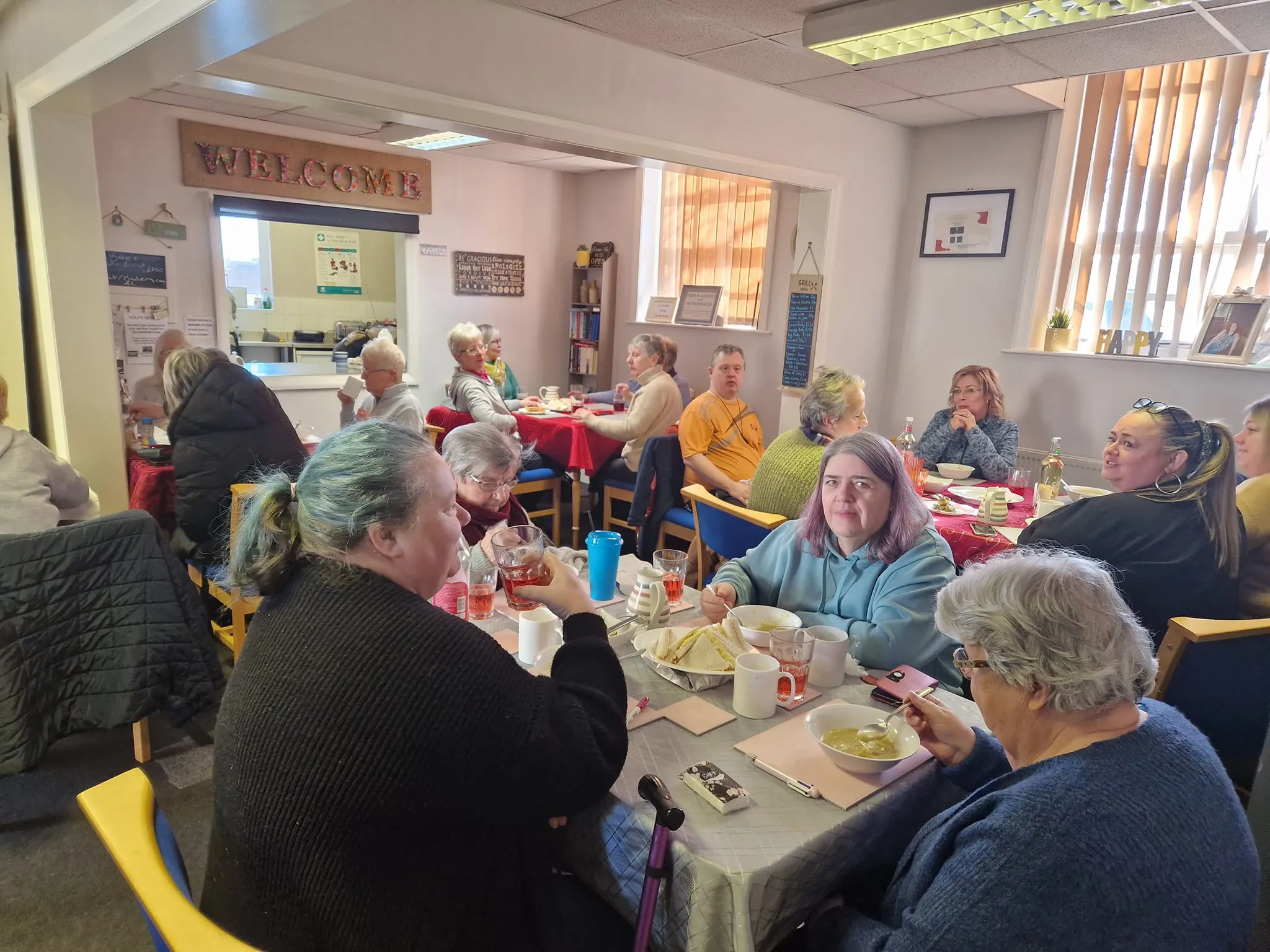 People enjoying a meal together in the café